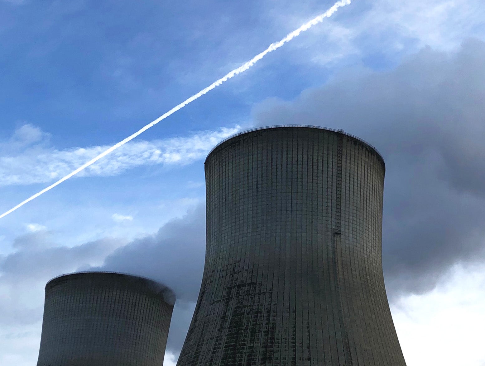 Plant Vogtle's Unit 1 & 2 cooling towers breathe steam into the sky. The four reactors at Plant Vogtle represent the largest capacity for nuclear production in the United States.