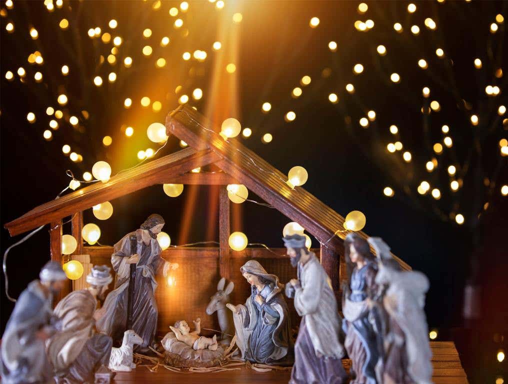 CSRA Christmas Church Services - a nativity with sparkling lights behind/around it