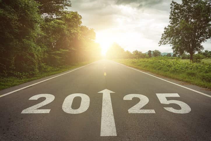 Word Of The Year post - image: New year 2025 or straightforward concept. Text 2025 written on the road in the middle of asphalt road at sunset. Concept of planning , challenge, business strategy, opportunity ,hope, new life change.