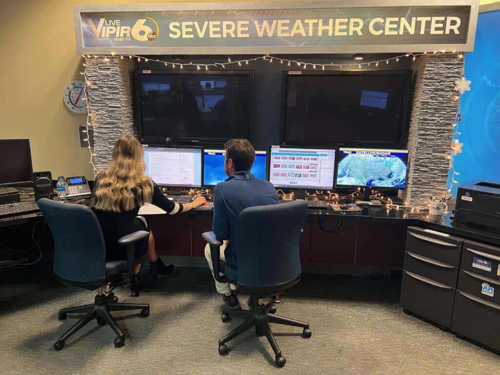 WJBF NewsChannel 6 Chief Meteorologist Jenna Petracci and Bryn 'Dub' Axelson check the weather models in advance of Dub's debut as a television weatherman.