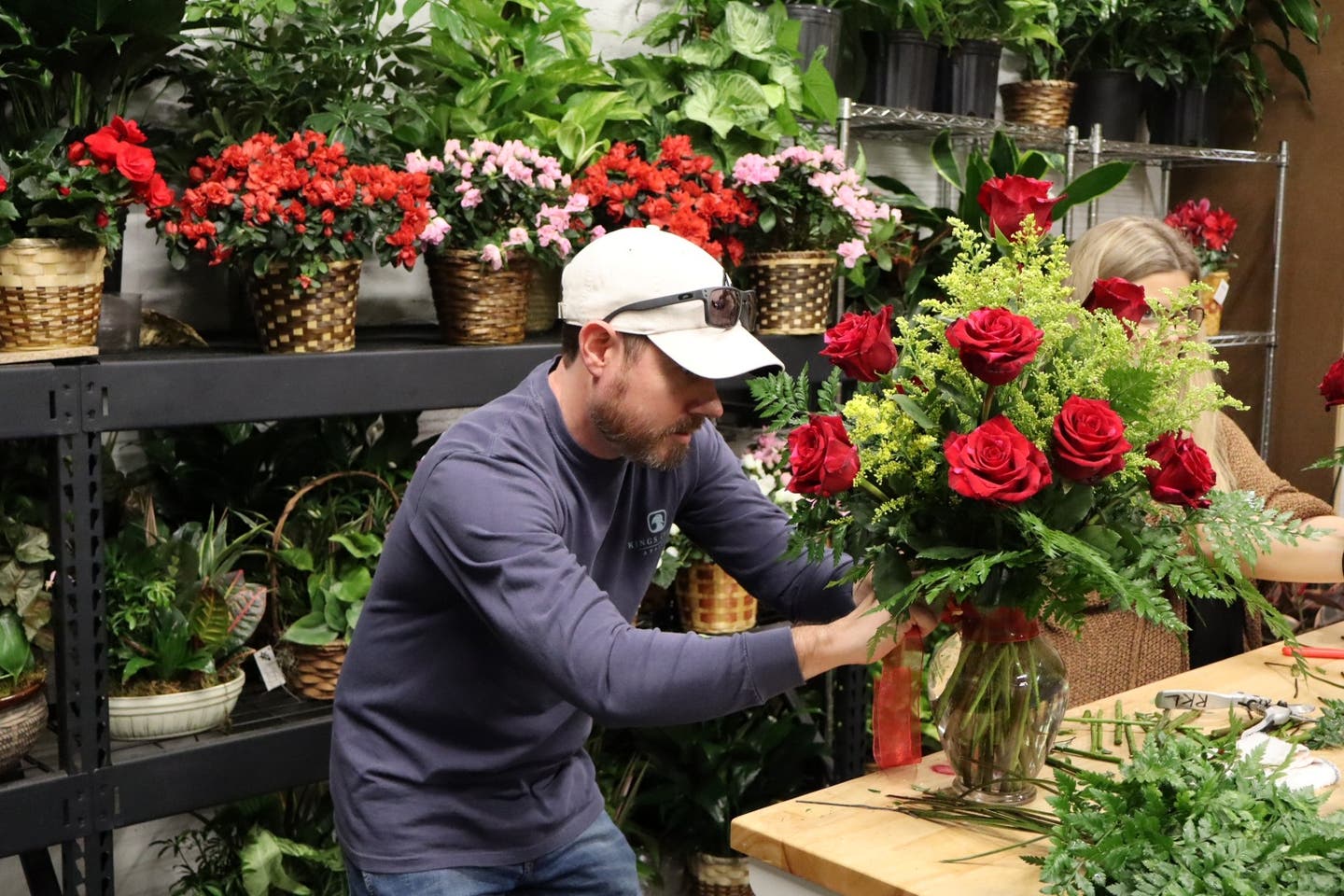 Axelson puts a wrap on his roses. While perhaps not perfect, we are calling his No Prep bouquet a success.