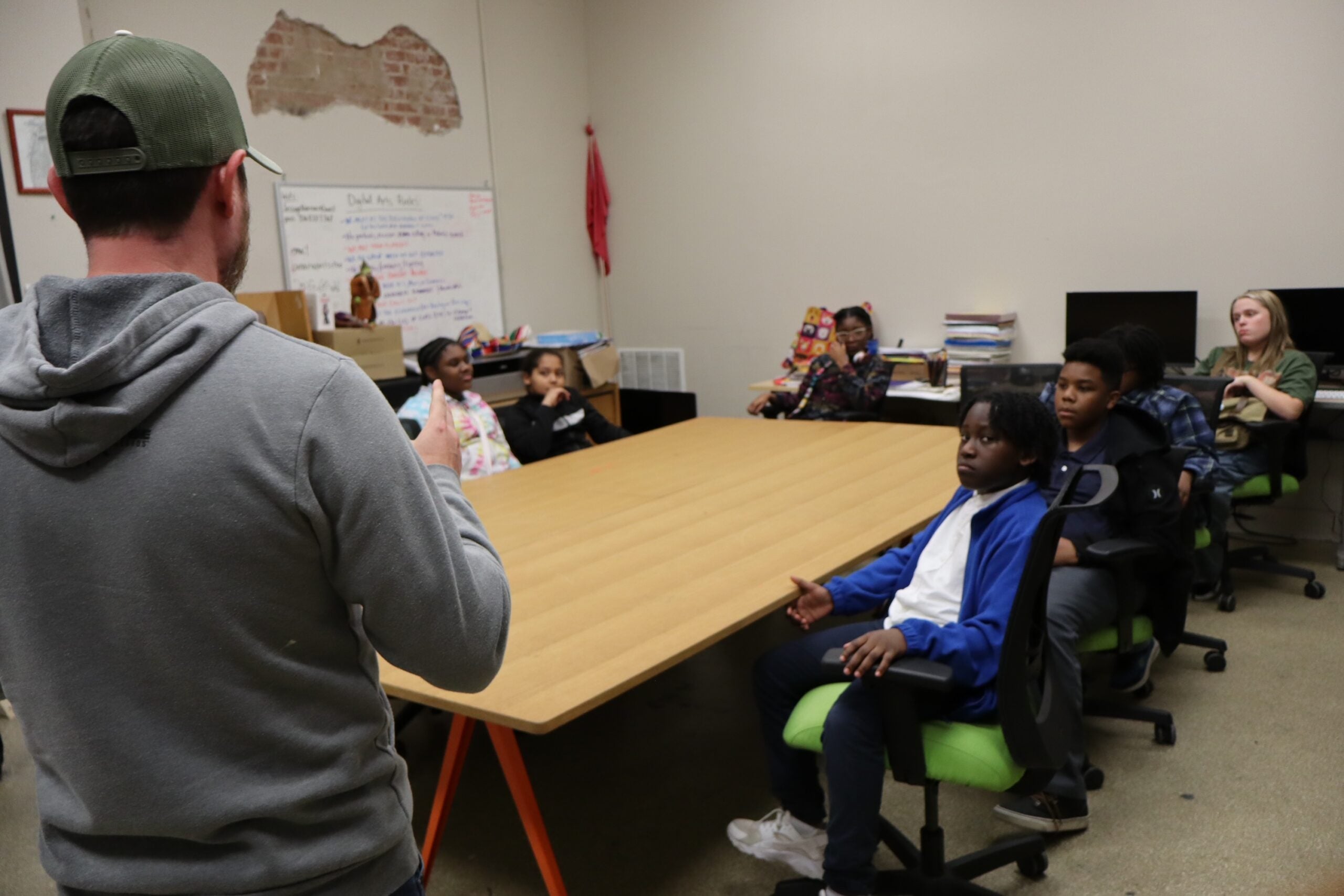 Students listen - and learn - as Bryan 'Dub' Axelson teaches about speaking, recording, and how to make one work for the other at the Jessye Norman School of the Arts in Augusta, Georgia.