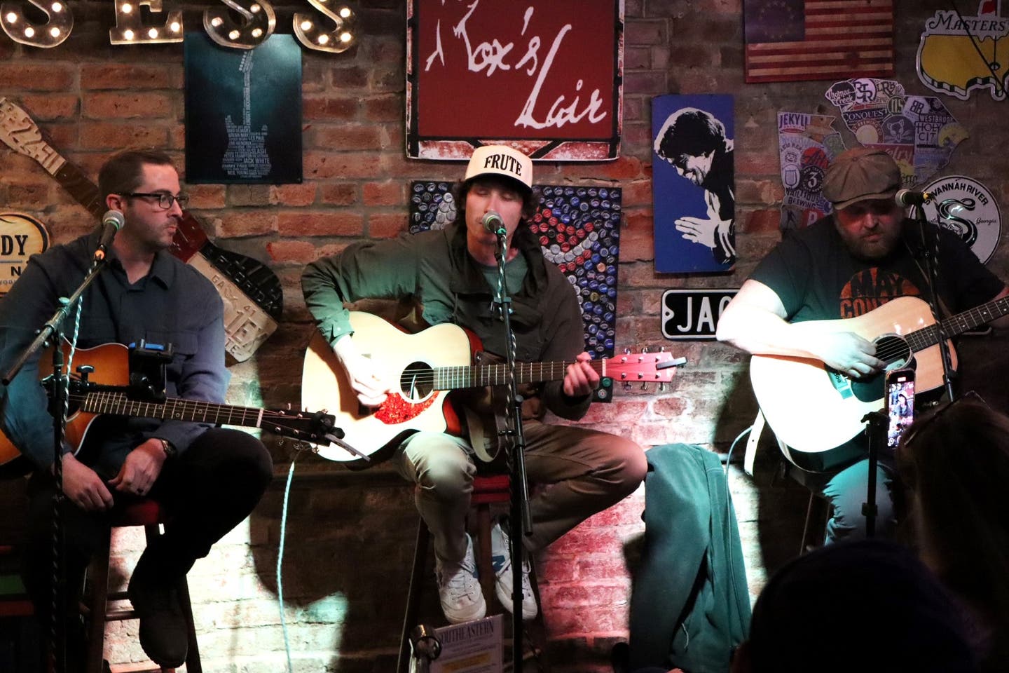 (L-R) Justin Anderson, Riley Dugan, and Josh Pierce perform at the February edition of the Southeaster Songwriter Series.