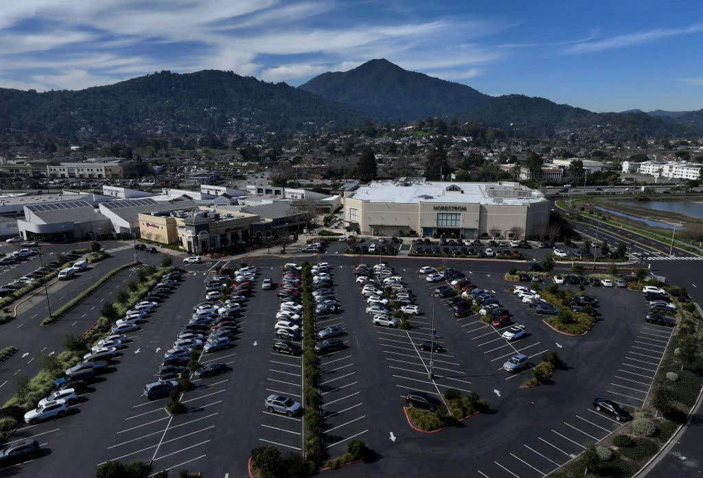 CORTE MADERA, CALIFORNIA - FEBRUARY 28: An aerial view of the parking lot at The Village at Corte Madera on February 28, 2025 in Corte Madera, California. The People's Union USA, a grassroots group, is called for an "economic boycott" on Friday and urged Americans not to shop for 24 hours. The boycott follows a rollback of diversity, equity and inclusion initiatives at several companies.