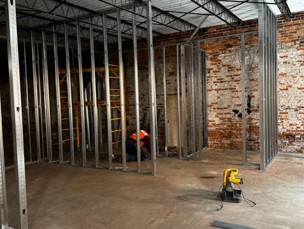 Work, rehearsal and storage spaces are being framed out in the new Augusta Players facility on Ellis Street. The building was once stables and most recently housed a classic car collection.