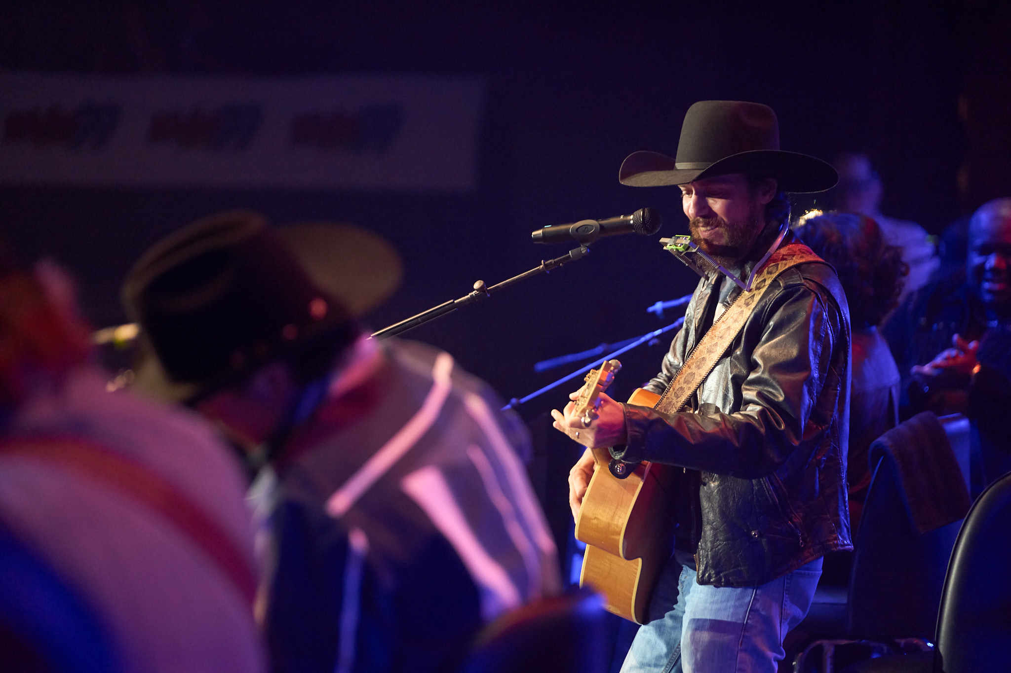 Chris Janson plays a little guitar at the 2024 Guitar Pull concert. He also played the keys, harmonica, the occasional kickdrum and, of course, sang.