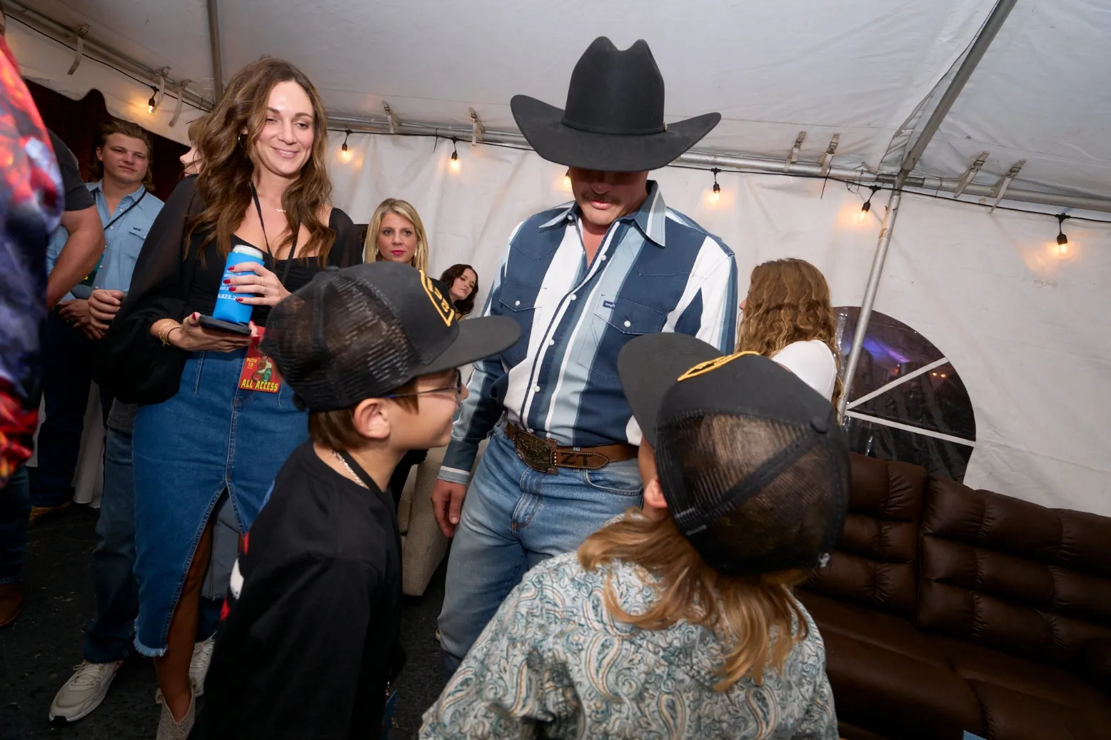 Zach Top, one the the performers at the first of two 2024 Guitar Pull concerts, meets and greets young fans prior to the show.