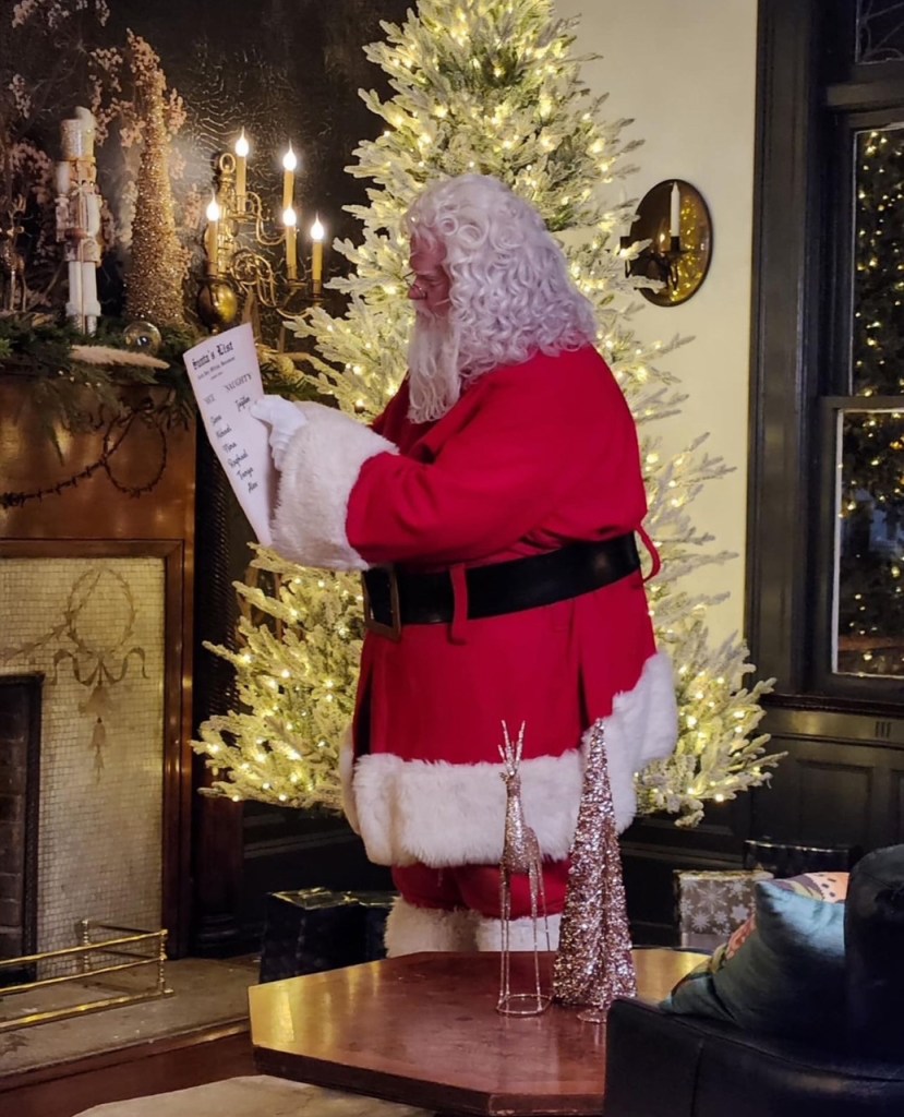 Santa Claus checking it twice at the Perkins-Cullum house on Greene Street.